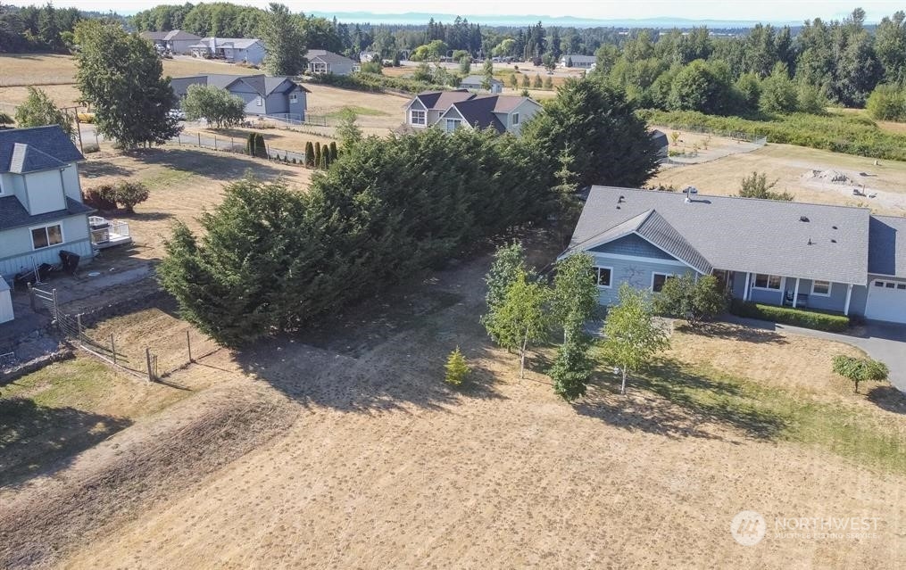 2493 Atterberry Road Sequim, WA 98382 - Photo 9 of 29 an aerial view of a house with a yard basket ball court and outdoor seating