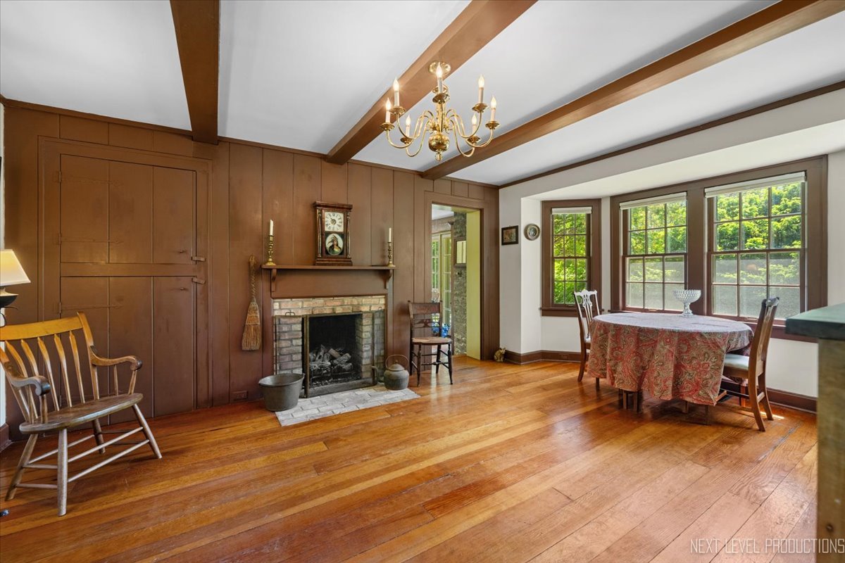 301 South 1st Street Geneva, IL 60134 - Photo 7 of 25 a view of a livingroom with furniture and a fireplace