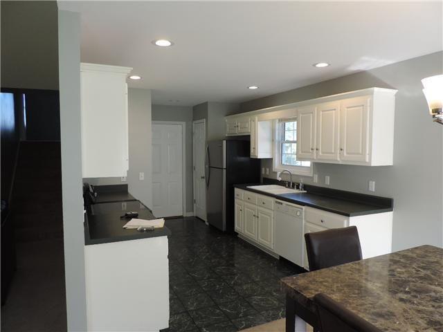 124 Foxrun Springfield, TN 37172 - Photo 20 of 20 Plenty of counters and cabinets! Refrigerator, Stove/Oven, Built-In Microwave and Dishwasher all remain. All that's needed is the cook!
