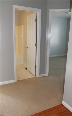 124 Foxrun Springfield, TN 37172 - Photo 6 of 20 Small hall access to two additional bedrooms and full bath.
