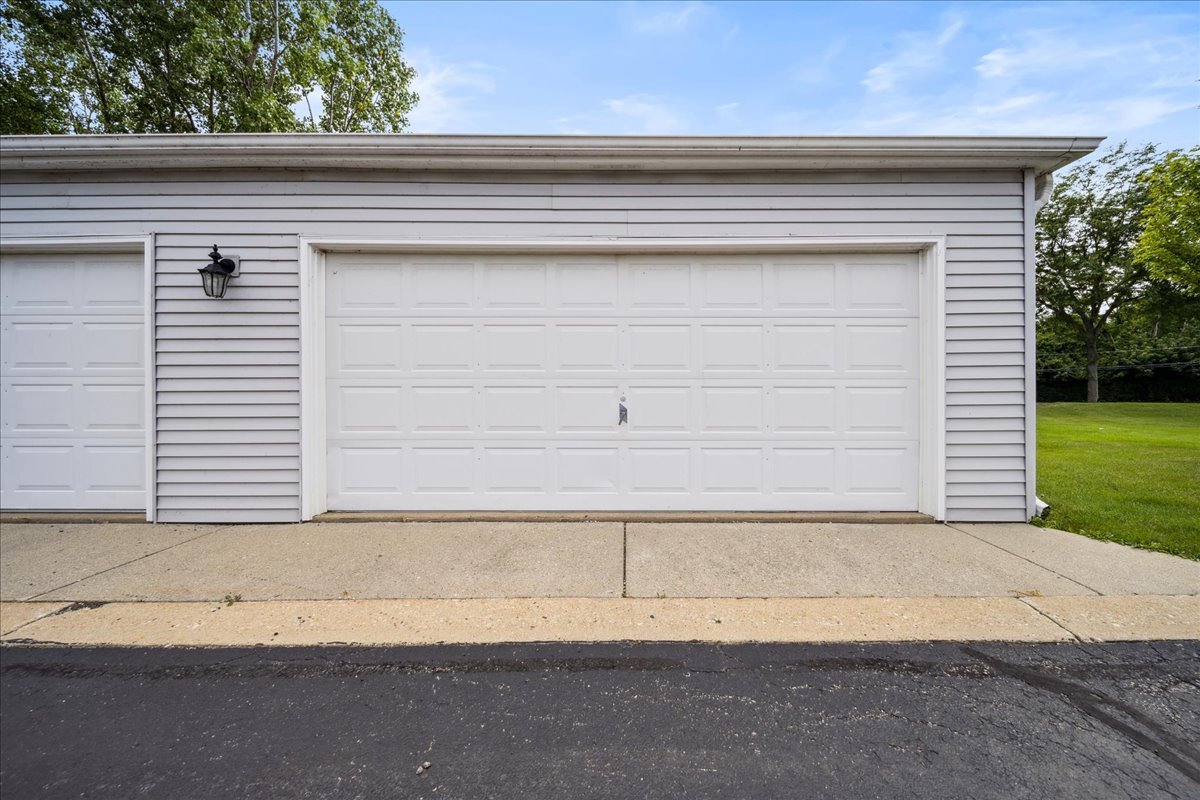 935 Golf Course Road, Unit 1 Crystal Lake, IL 60014 - Photo 2 of 10 a view of wooden door and a window