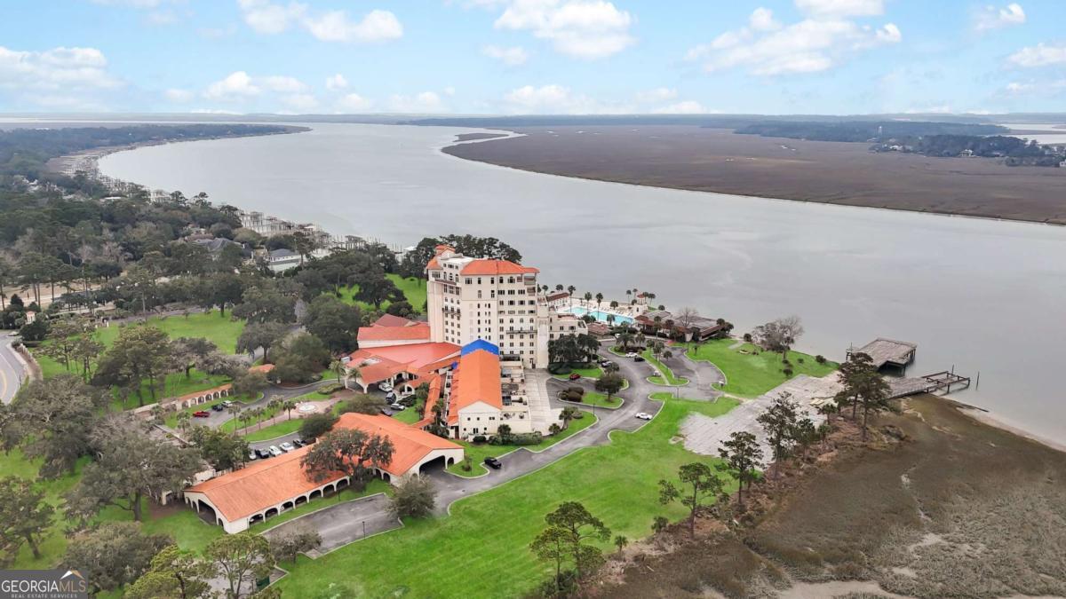 700 Wilmington Island Road, Unit 201 Savannah, GA 31410 - Photo 45 of 51 an aerial view of a house with a yard and lake view