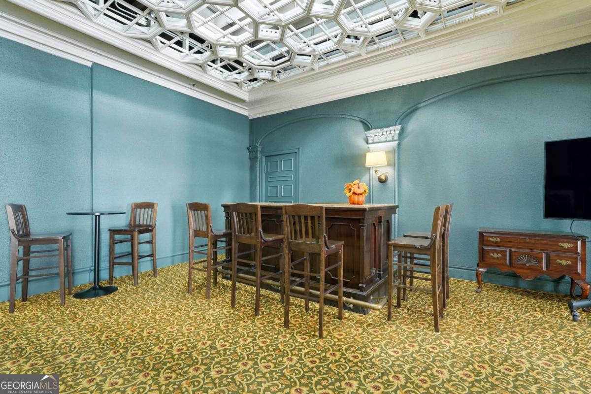 700 Wilmington Island Road, Unit 201 Savannah, GA 31410 - Photo 10 of 51 a workspace with furniture