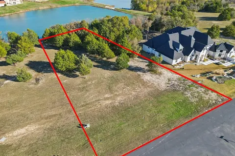 a view of swimming pool with a patio