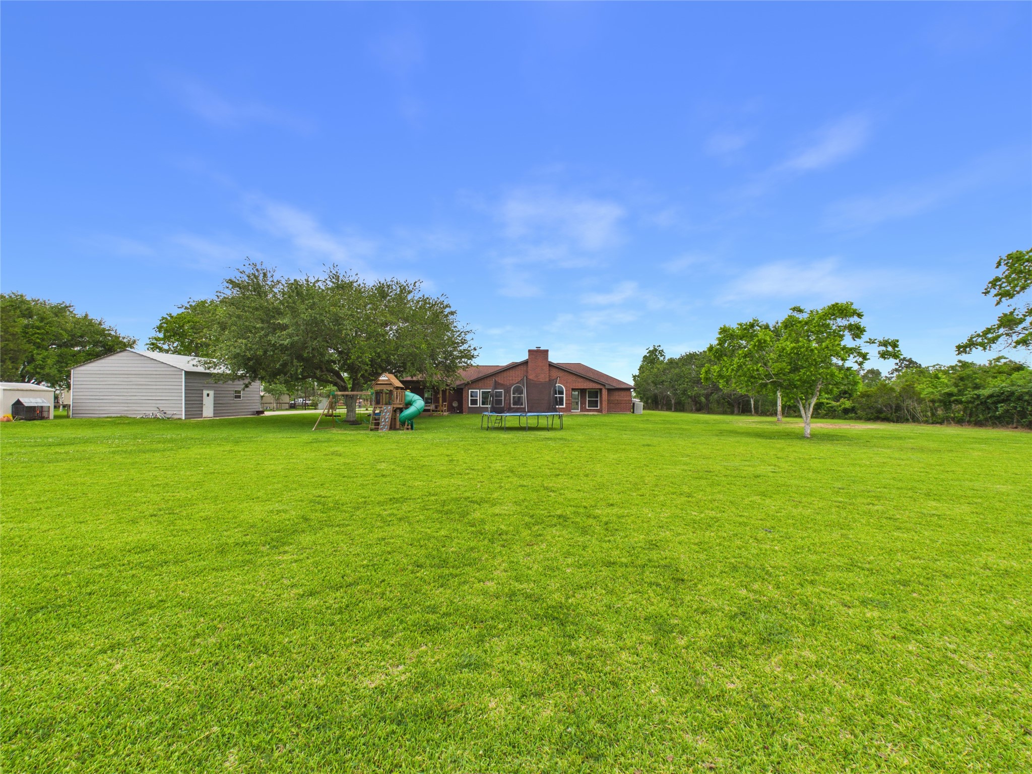 4610 Mustang Road Alvin, TX 77511 - Photo 46 of 50 Home! Detached Garage/workshop! Well house! Storage shed! Shade Trees! ROOM TO ROAM!!!