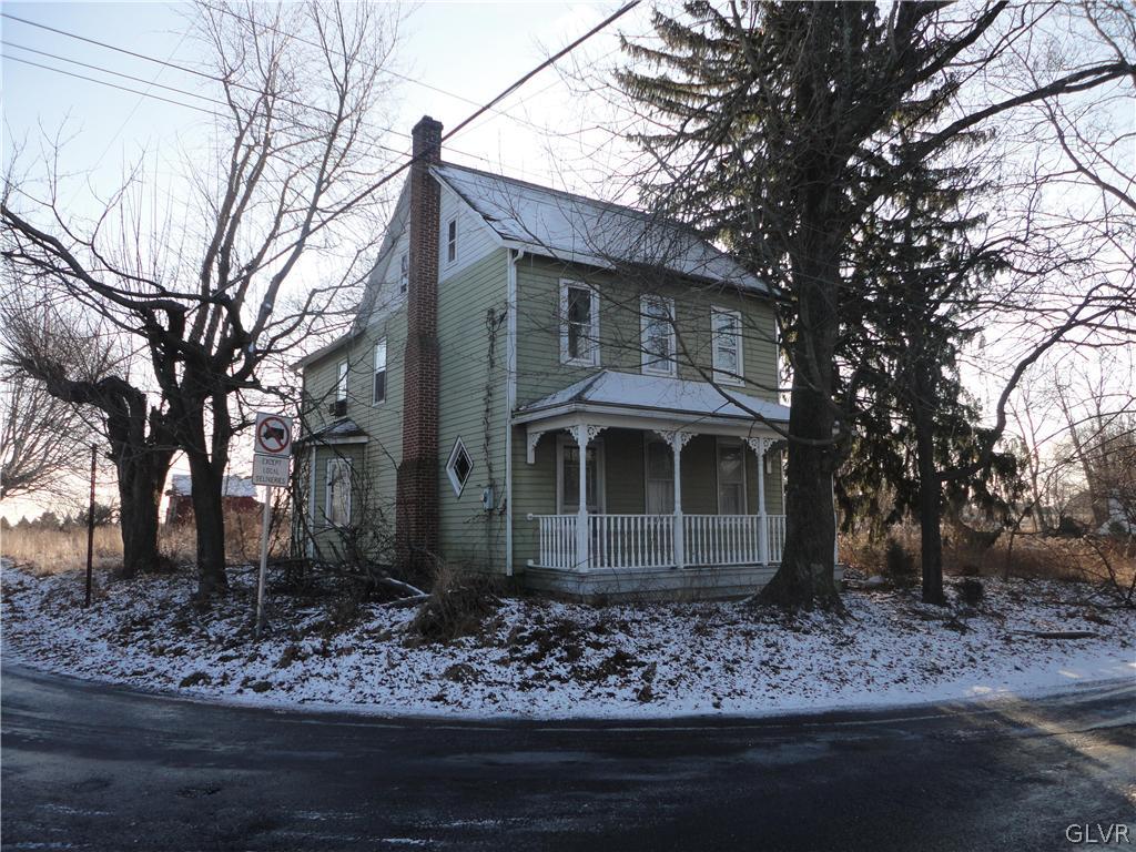 598 Jacobsburg Road Nazareth, PA 18064 - Photo 3 of 3 a front view of a house with a garden