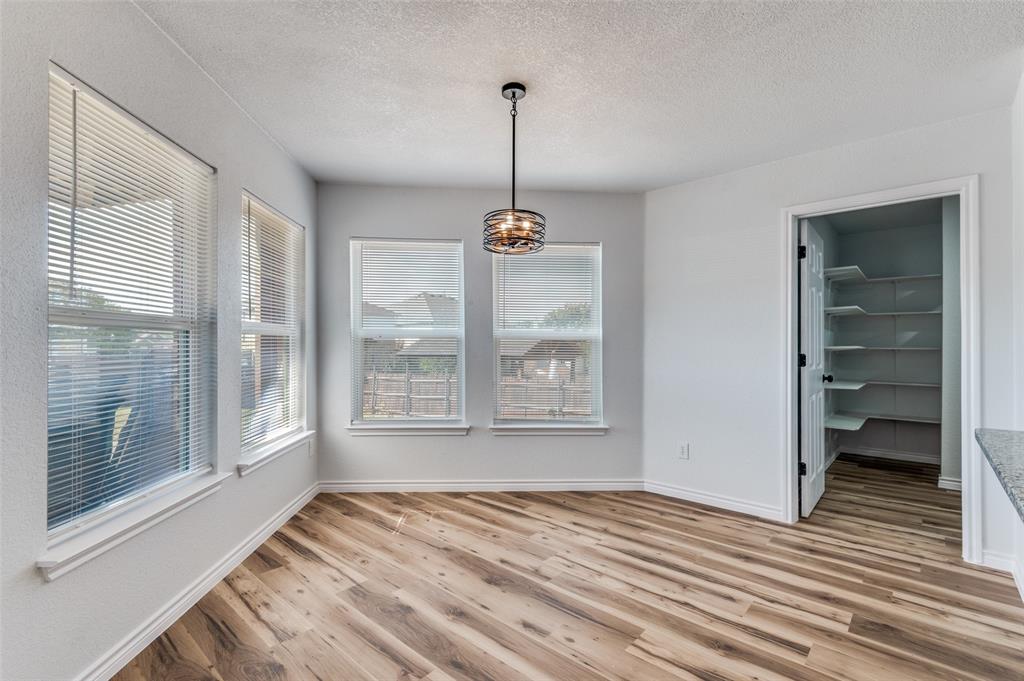 6524 Willow Oak Court Fort Worth, TX 76112 - Photo 15 of 15 a view of empty room with windows and entryway