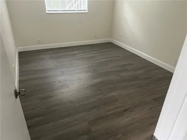 a bath room with a bath tub and a shower