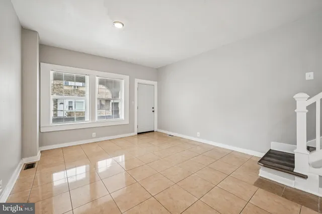 an empty room with windows