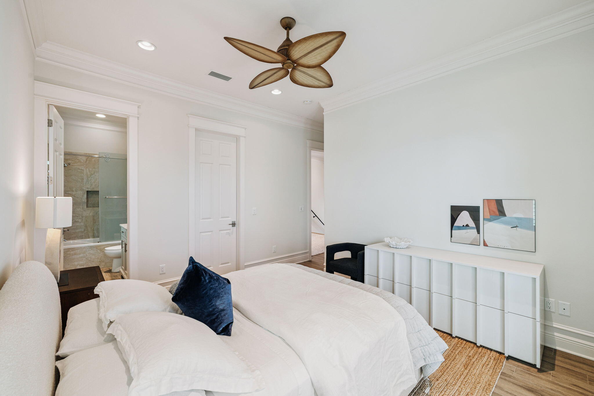 358 Rue Caribe Miramar Beach, FL 32550 - Photo 34 of 65 a bedroom with a bed and a chandelier