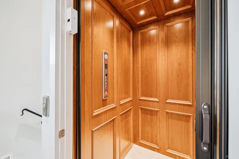 a view of a house with wooden stairs