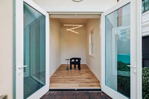 a swimming pool with outdoor seating yard and barbeque oven