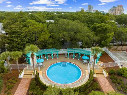 an aerial view of residential houses with outdoor space