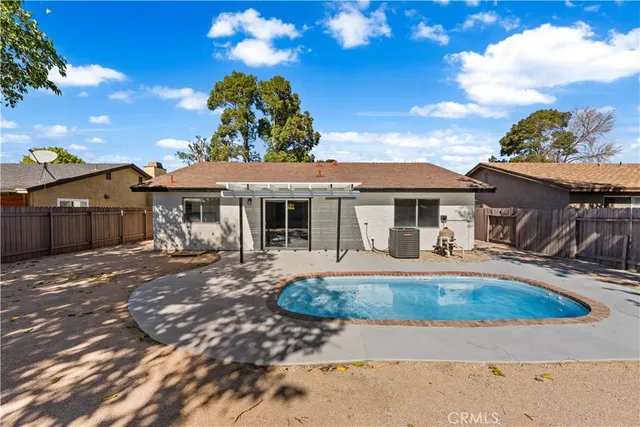 a front view of a house with a patio