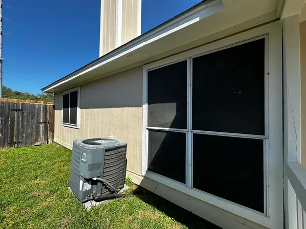 a view of backyard with cabin