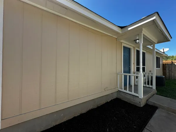 a house view with a backyard space