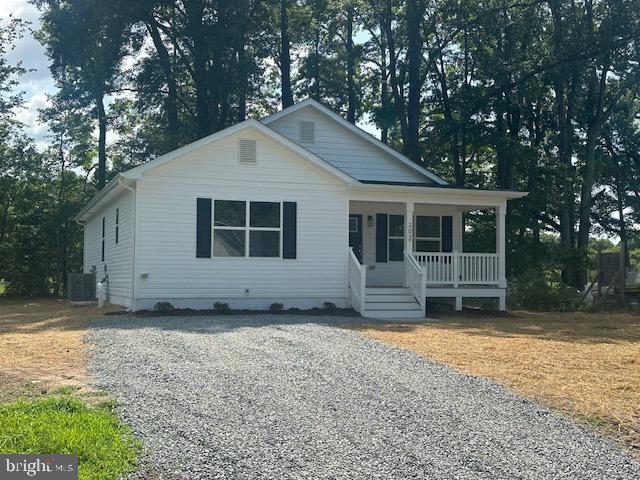 a house with trees in the background