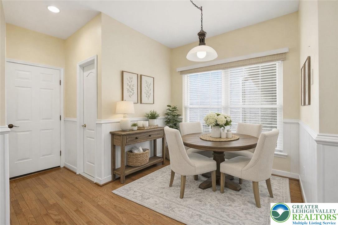 2493 Thistle Road Lower Macungie Township, PA 18062 - Photo 14 of 38 a view of a dining room with furniture window and wooden floor
