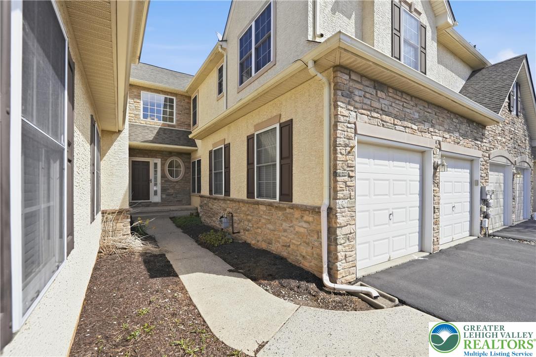 2493 Thistle Road Lower Macungie Township, PA 18062 - Photo 2 of 38 front view of a house