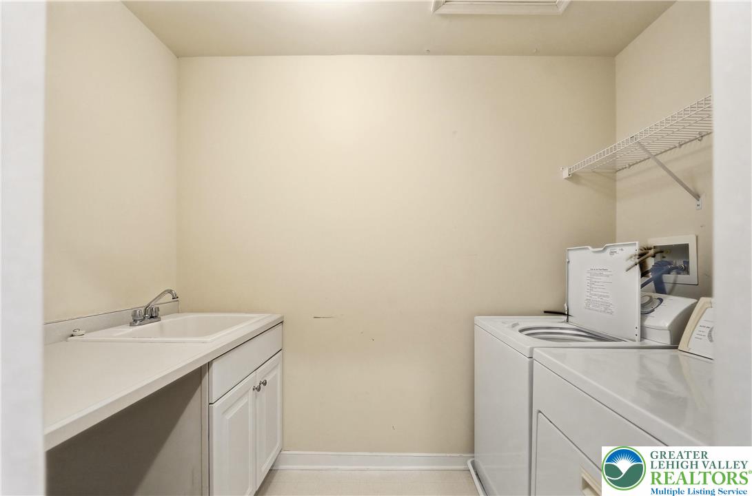 2493 Thistle Road Lower Macungie Township, PA 18062 - Photo 29 of 38 a utility room with dryer and washer