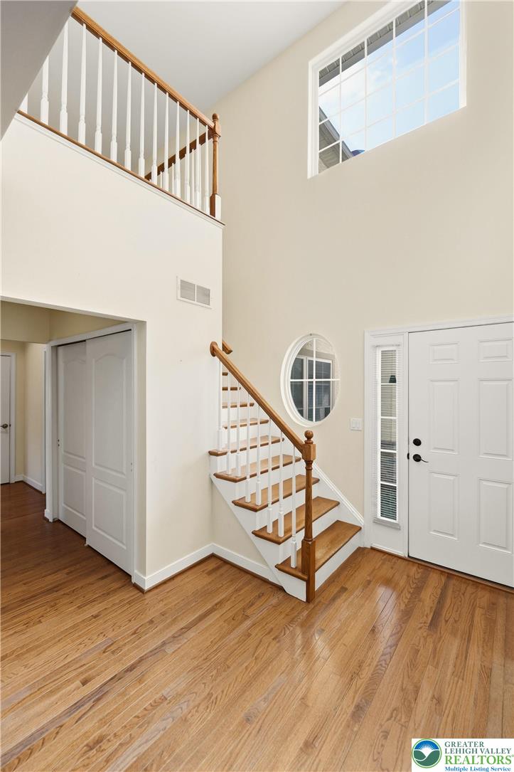 2493 Thistle Road Lower Macungie Township, PA 18062 - Photo 5 of 38 a view of staircase with white walls and a window