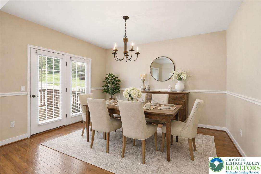 2493 Thistle Road Lower Macungie Township, PA 18062 - Photo 9 of 38 a view of a dining room with furniture window and wooden floor