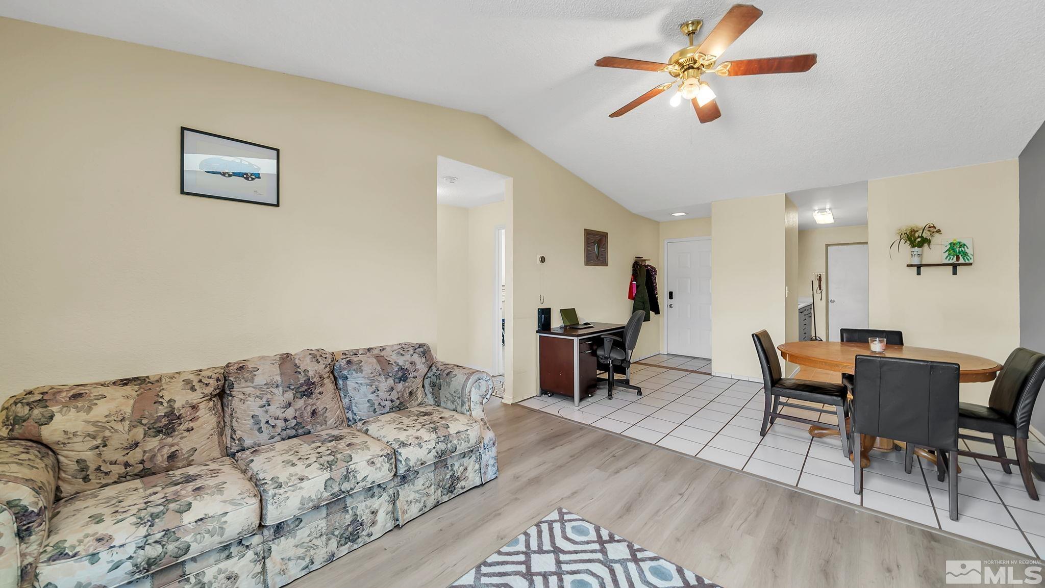 10035 Humite Lane Reno, NV 89506 - Photo 8 of 16 a living room with furniture and wooden floor