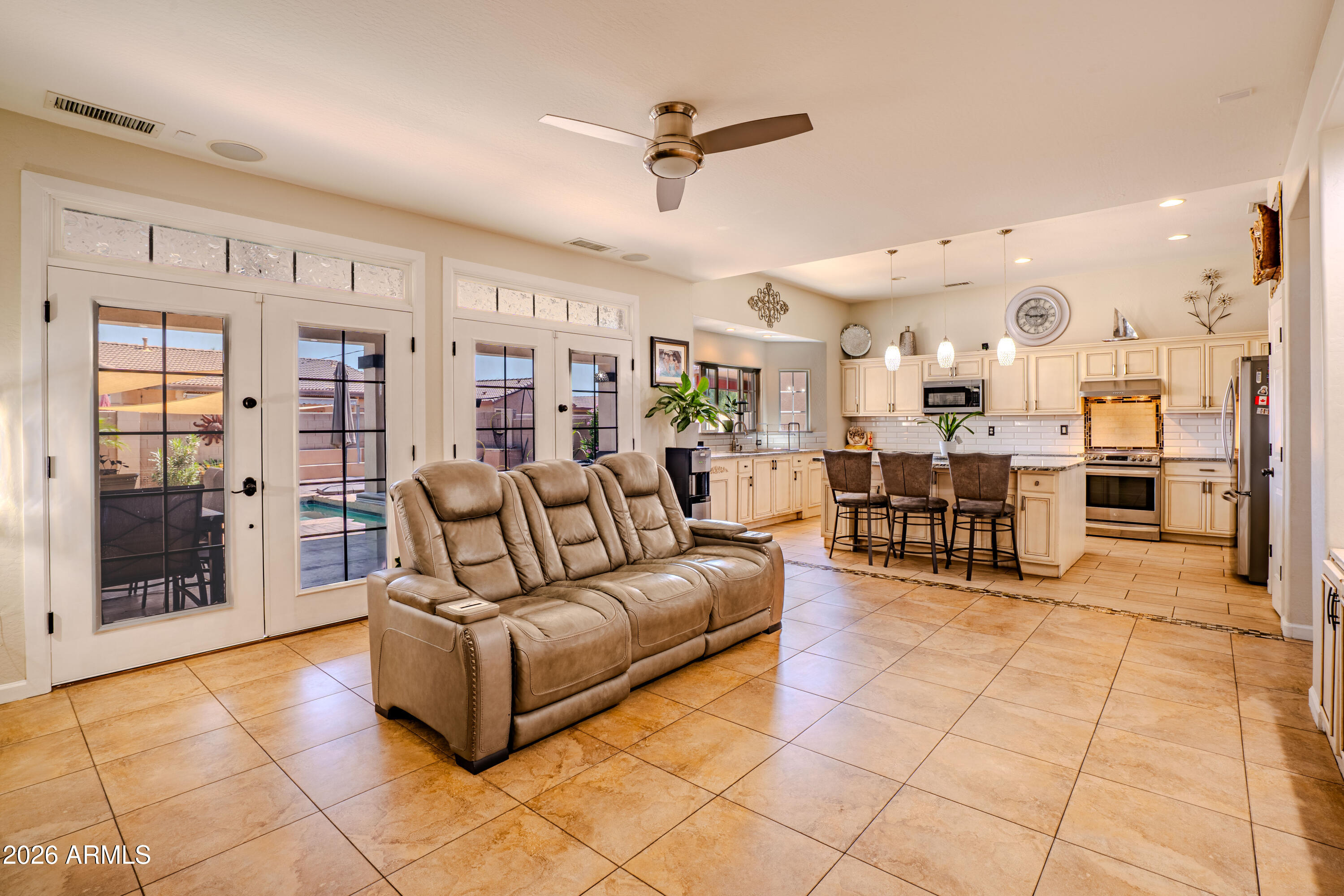 5137 West Grenadine Road Laveen, AZ 85339 - Photo 21 of 53 a living room with furniture and white walls