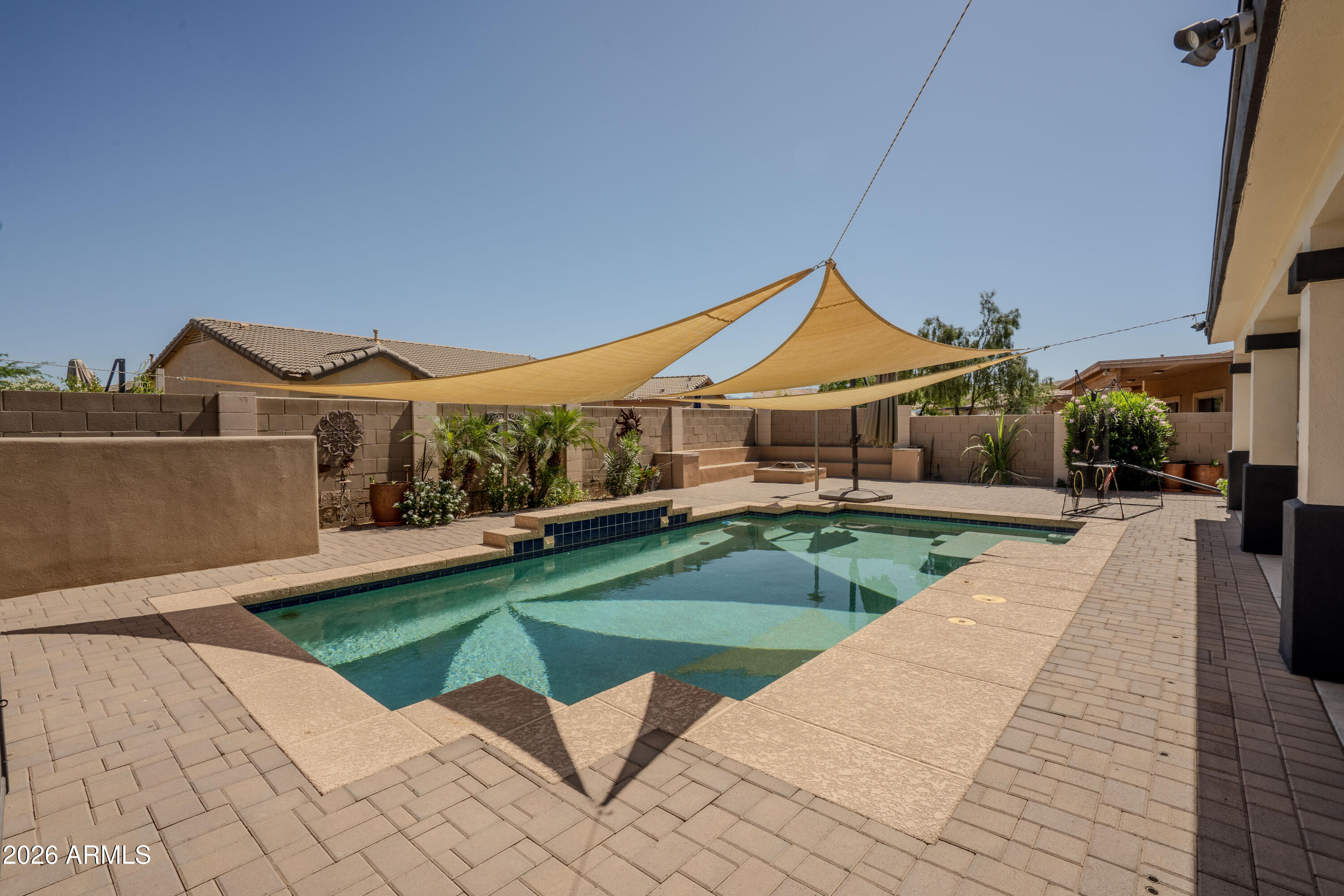 5137 West Grenadine Road Laveen, AZ 85339 - Photo 47 of 53 a view of a house with swimming pool