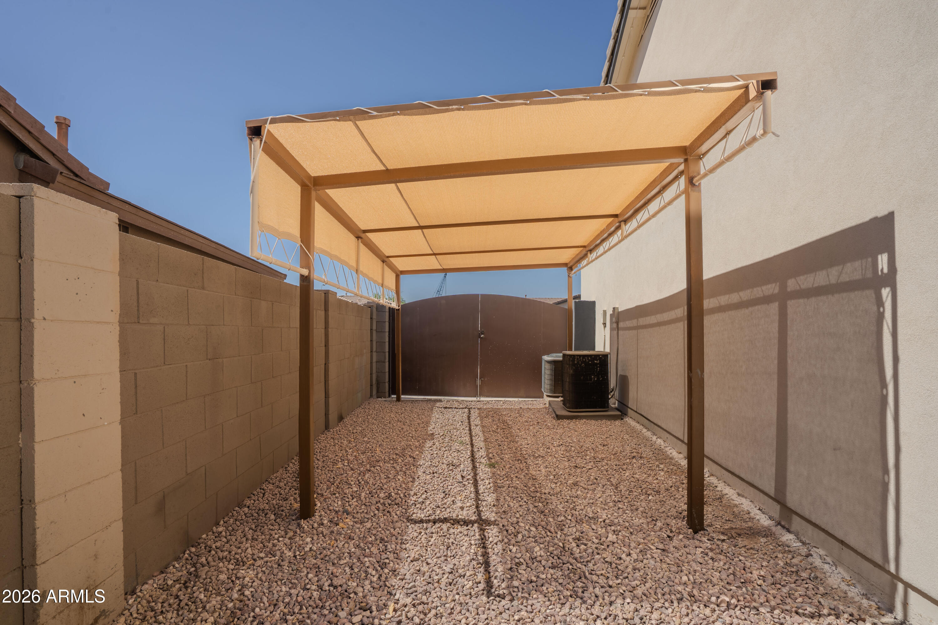 5137 West Grenadine Road Laveen, AZ 85339 - Photo 52 of 53 a view of a house with a outdoor space