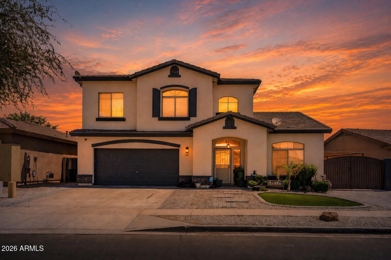 5137 West Grenadine Road Laveen, AZ 85339 - Photo 53 of 53 a front view of a house with a yard