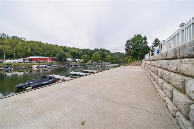 a view of roof deck with dining table and chair