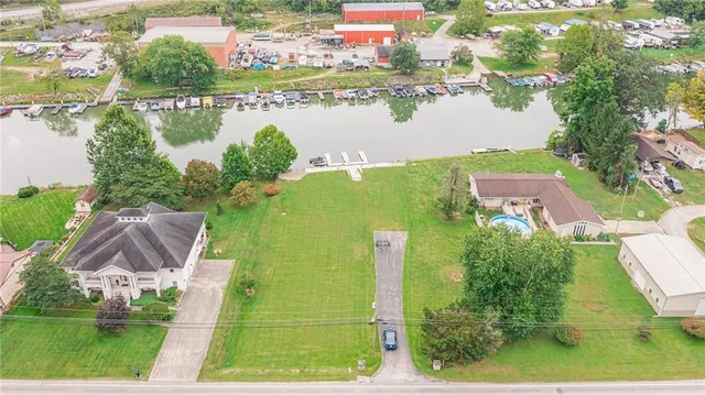 a view of a lake with a building in the background