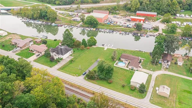 an aerial view of a houses with outdoor space