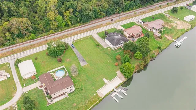a view of a chairs and table in patio