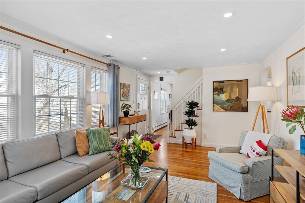 88 Menotomy Road Arlington, MA 02476 - Photo 14 of 40 a living room with furniture and a large window