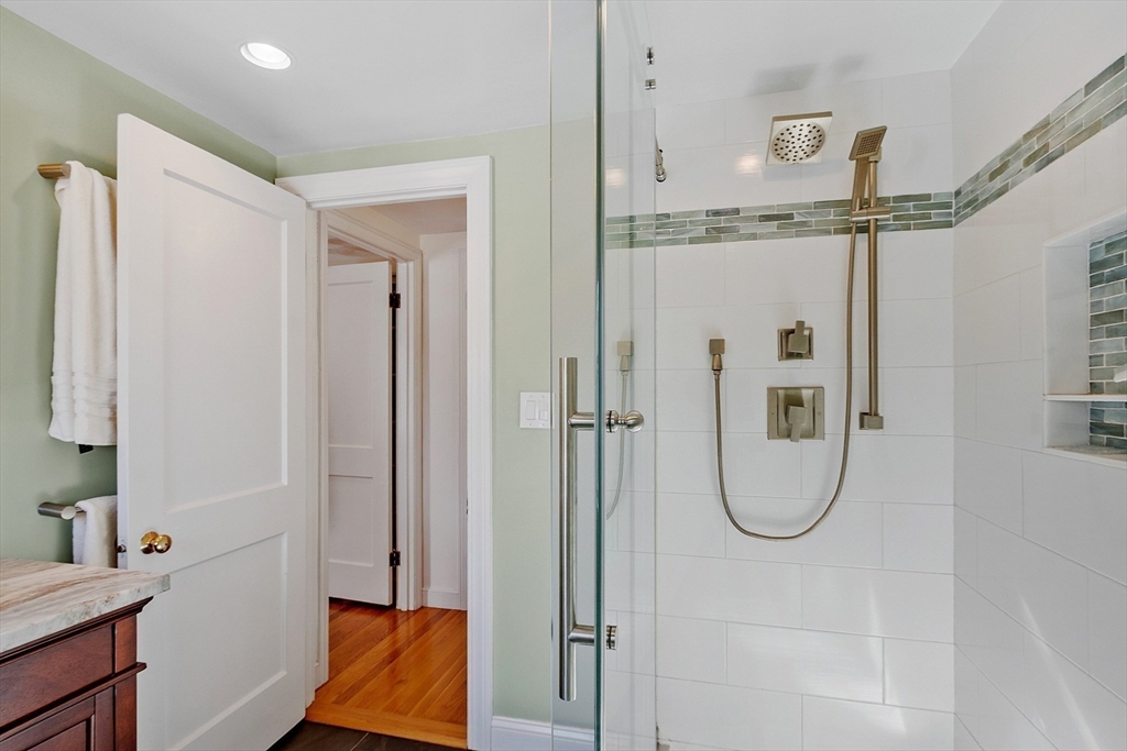 88 Menotomy Road Arlington, MA 02476 - Photo 28 of 40 a bathroom with a shower and a sink