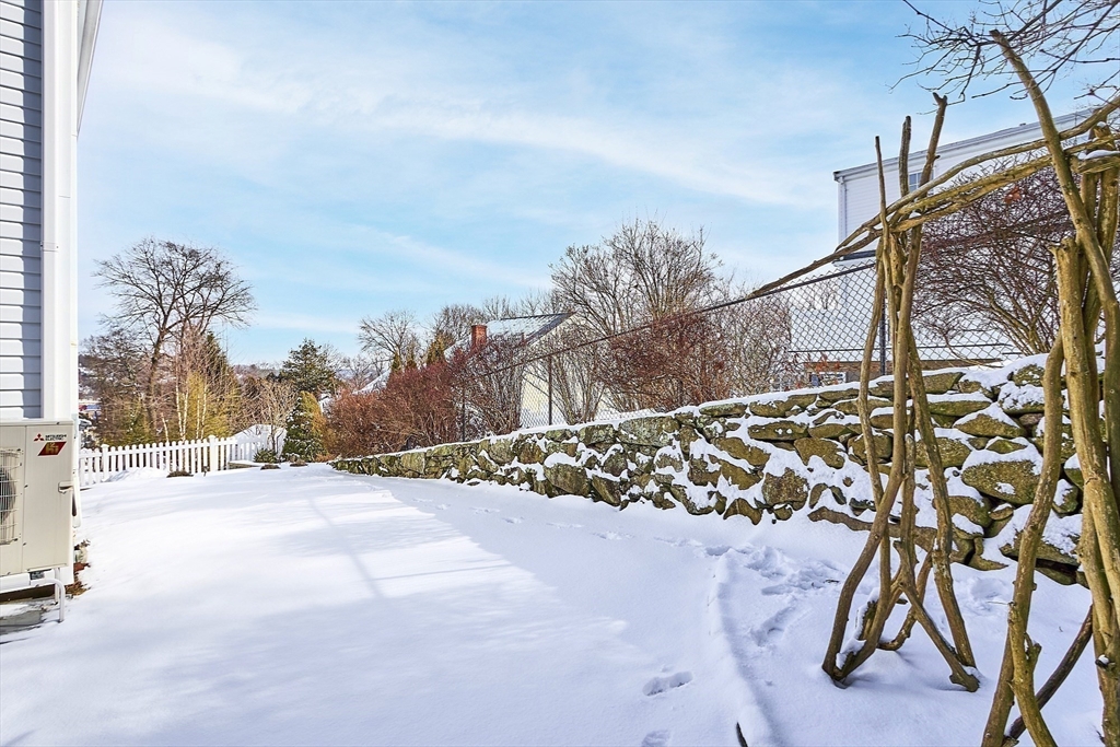 88 Menotomy Road Arlington, MA 02476 - Photo 30 of 40 a view of a backyard of the house