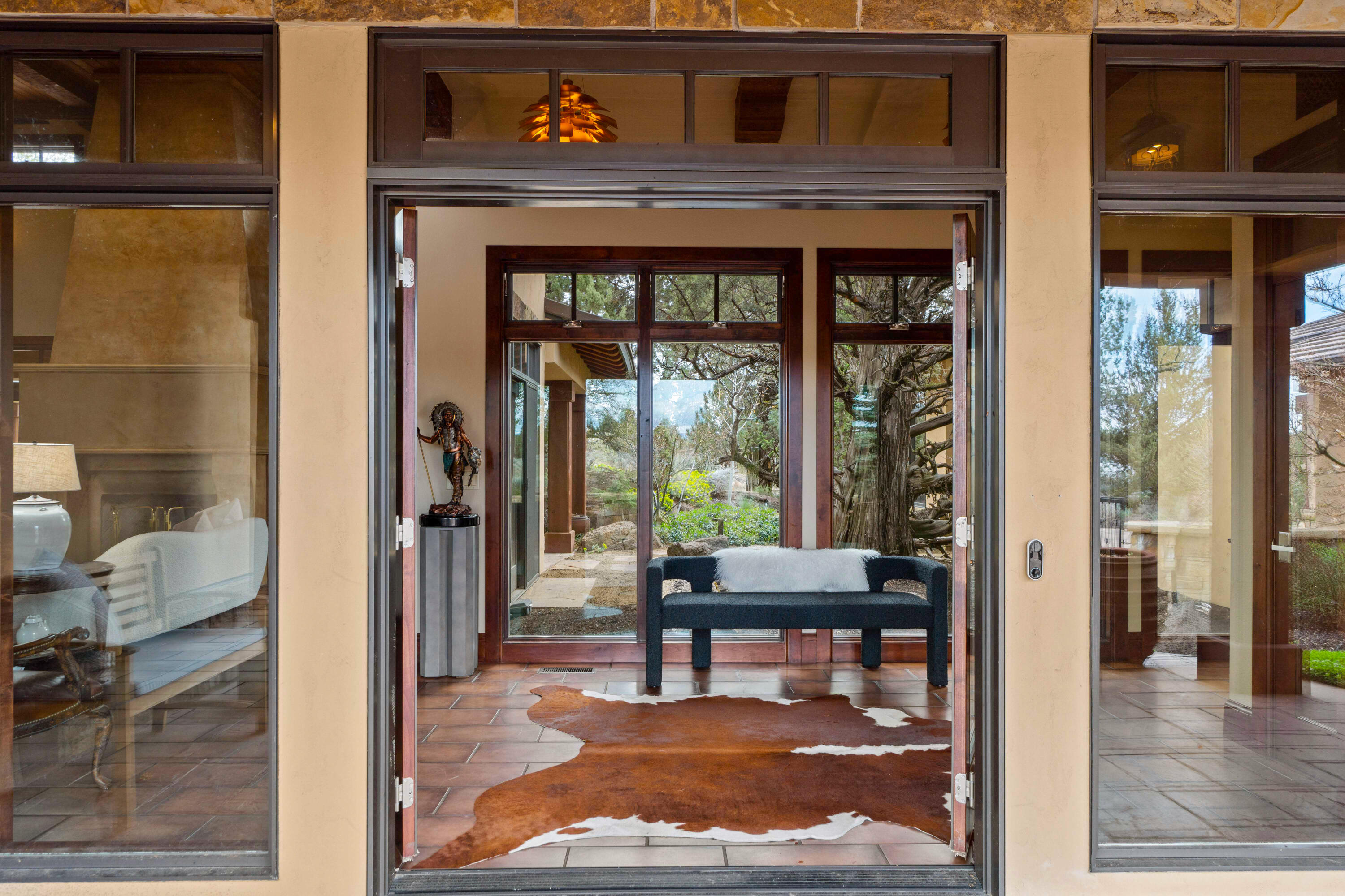 65904 Fazio Ln Bend Bend, OR 97701 - Photo 5 of 63 Light-filled windows and doors blend indoor/outdoor living seamlessly throughout.