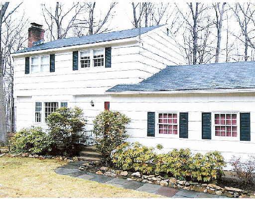 132 Old Sib Road Ridgefield, CT 06877 - Photo 1 of 1 a front view of a house with a yard