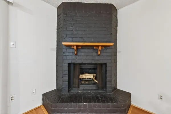 a living room with a fireplace