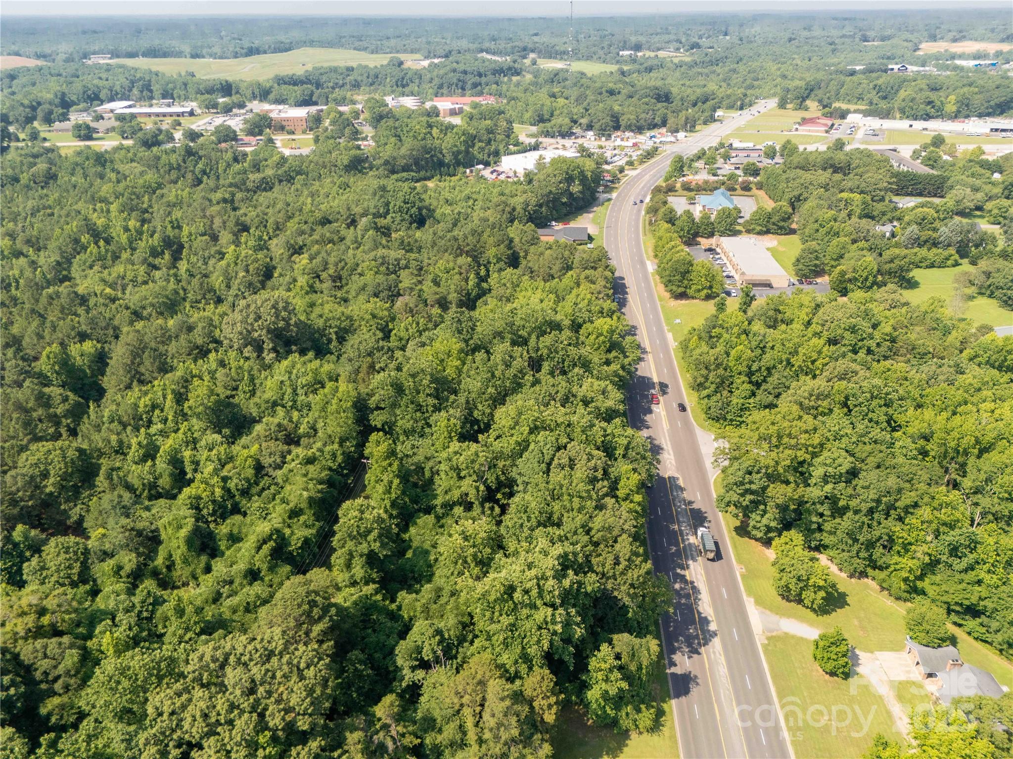 1853 Old York Road York, SC 29745 - Photo 5 of 14 an aerial view of residential houses with outdoor space and trees