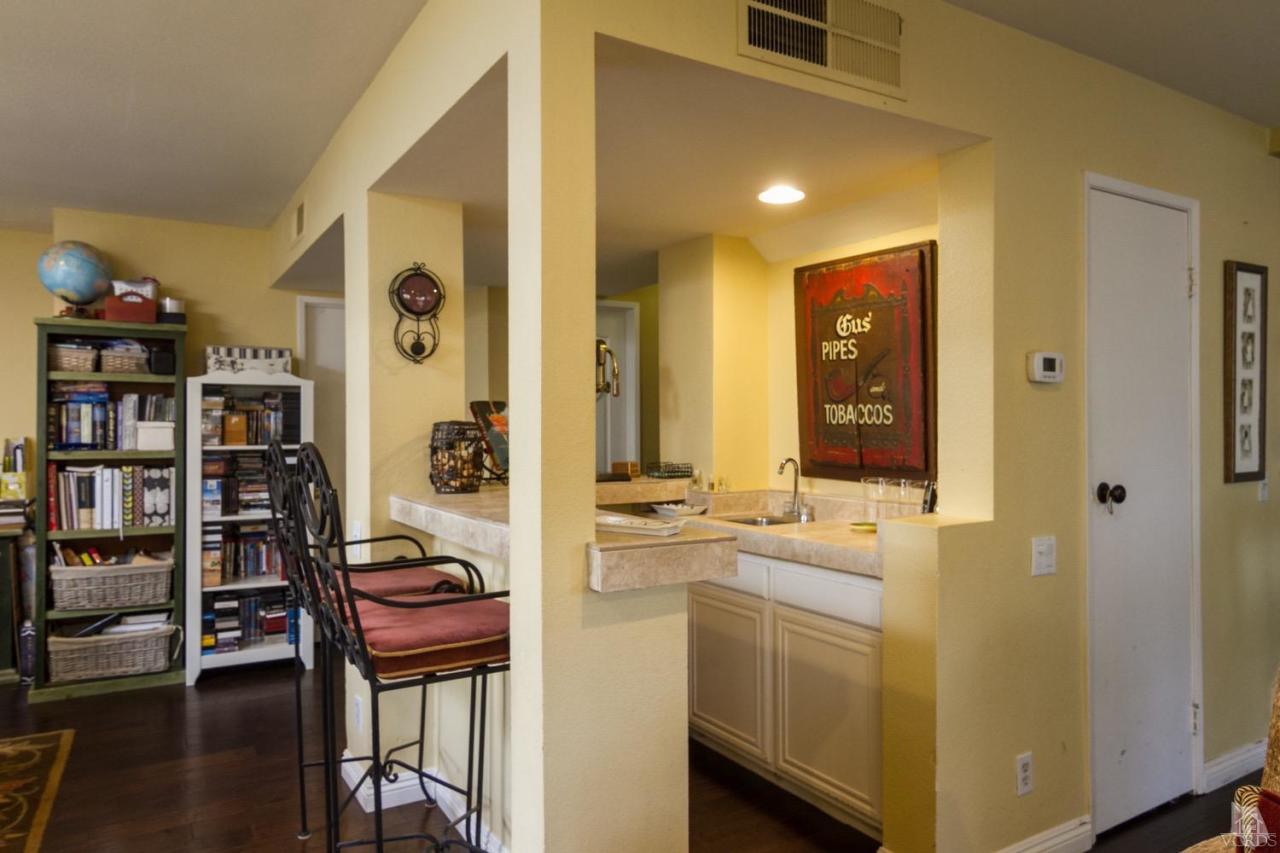 12685 Crystal Ranch Road Moorpark, CA 93021 - Photo 14 of 25 a view of a hallway with workspace and a window