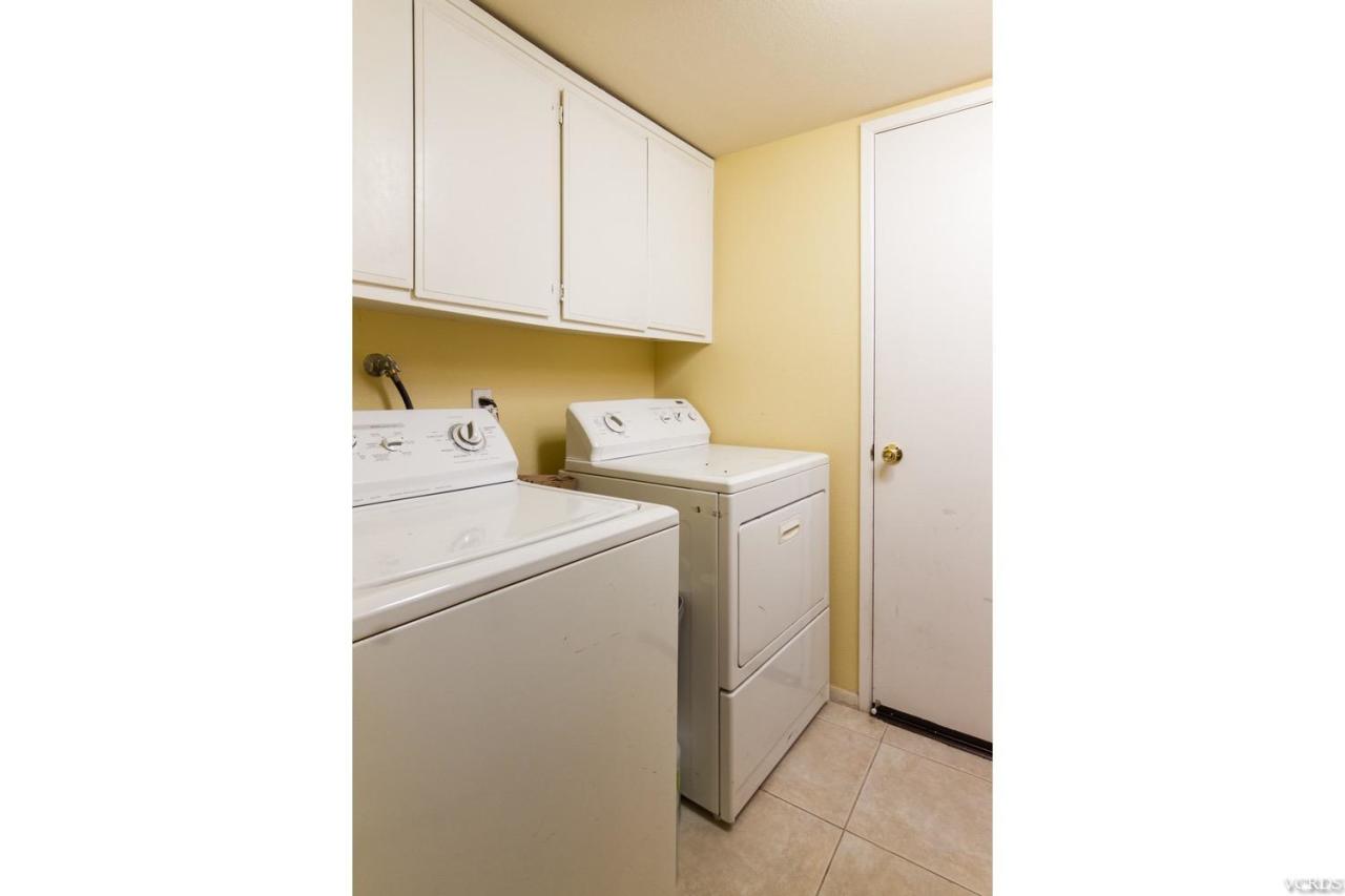 12685 Crystal Ranch Road Moorpark, CA 93021 - Photo 23 of 25 a utility room with dryer and washer