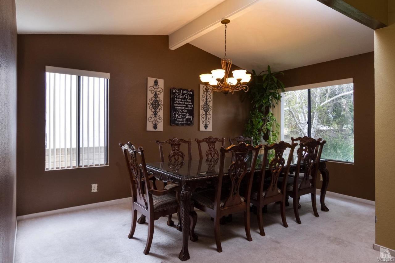 12685 Crystal Ranch Road Moorpark, CA 93021 - Photo 7 of 25 a view of a dining room with furniture window and chandelier