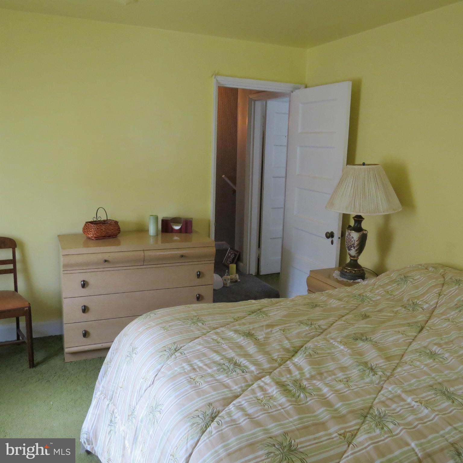 17 Township Road Dundalk, MD 21222 - Photo 13 of 25 a bedroom with a bed and a closet