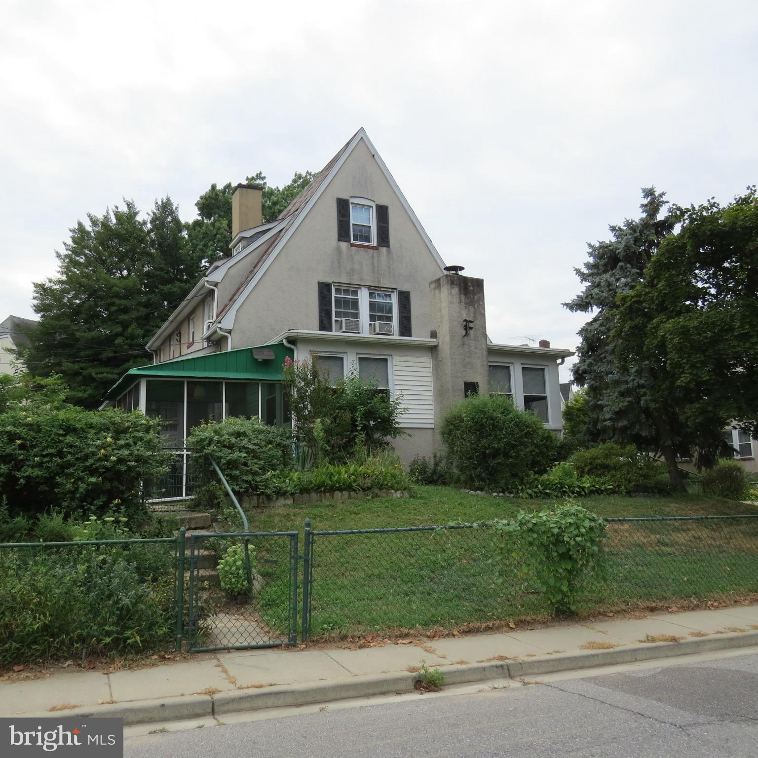17 Township Road Dundalk, MD 21222 - Photo 21 of 25 a front view of a house with a yard