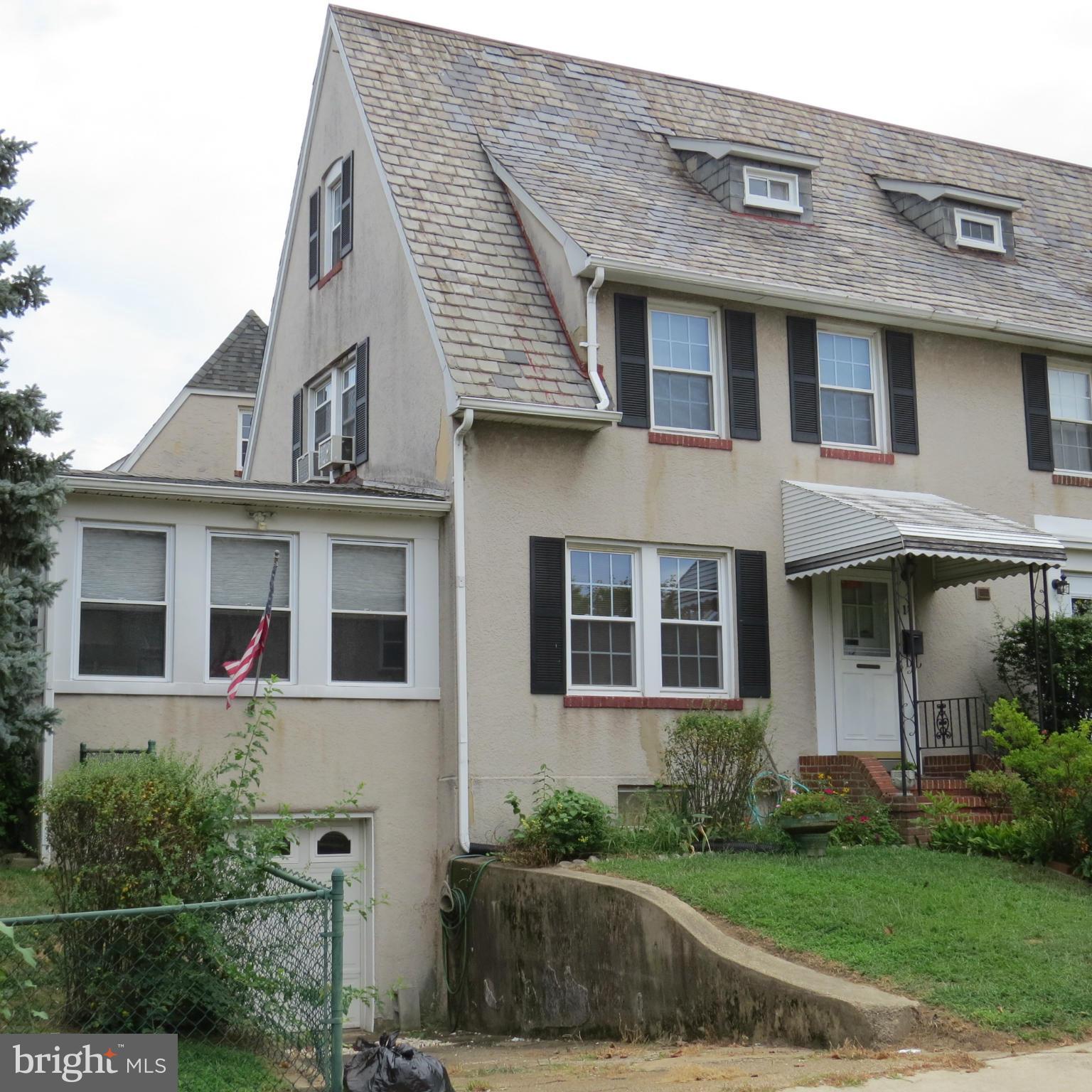 17 Township Road Dundalk, MD 21222 - Photo 24 of 25 a front view of a house with garden