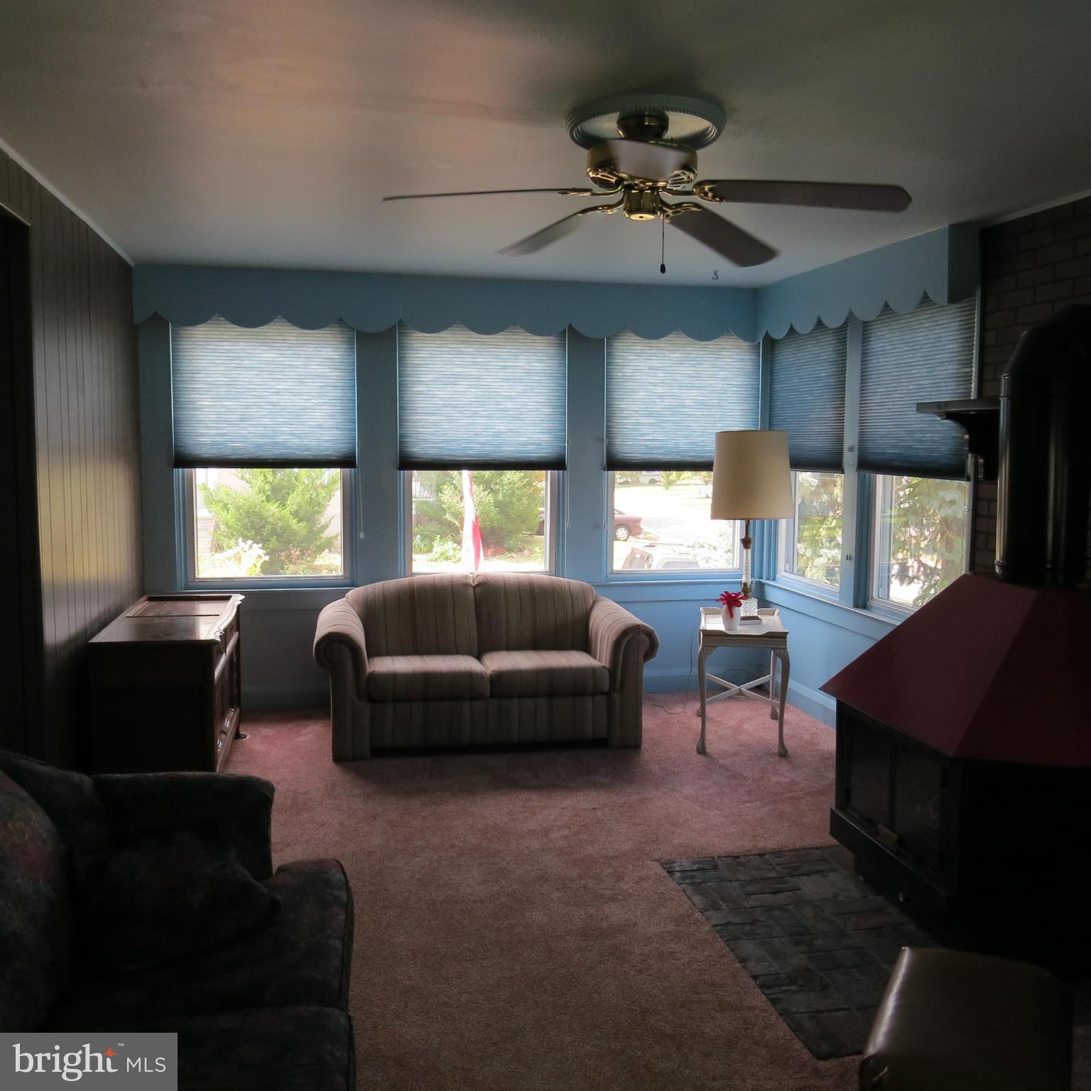 17 Township Road Dundalk, MD 21222 - Photo 10 of 25 a living room with furniture and a large window