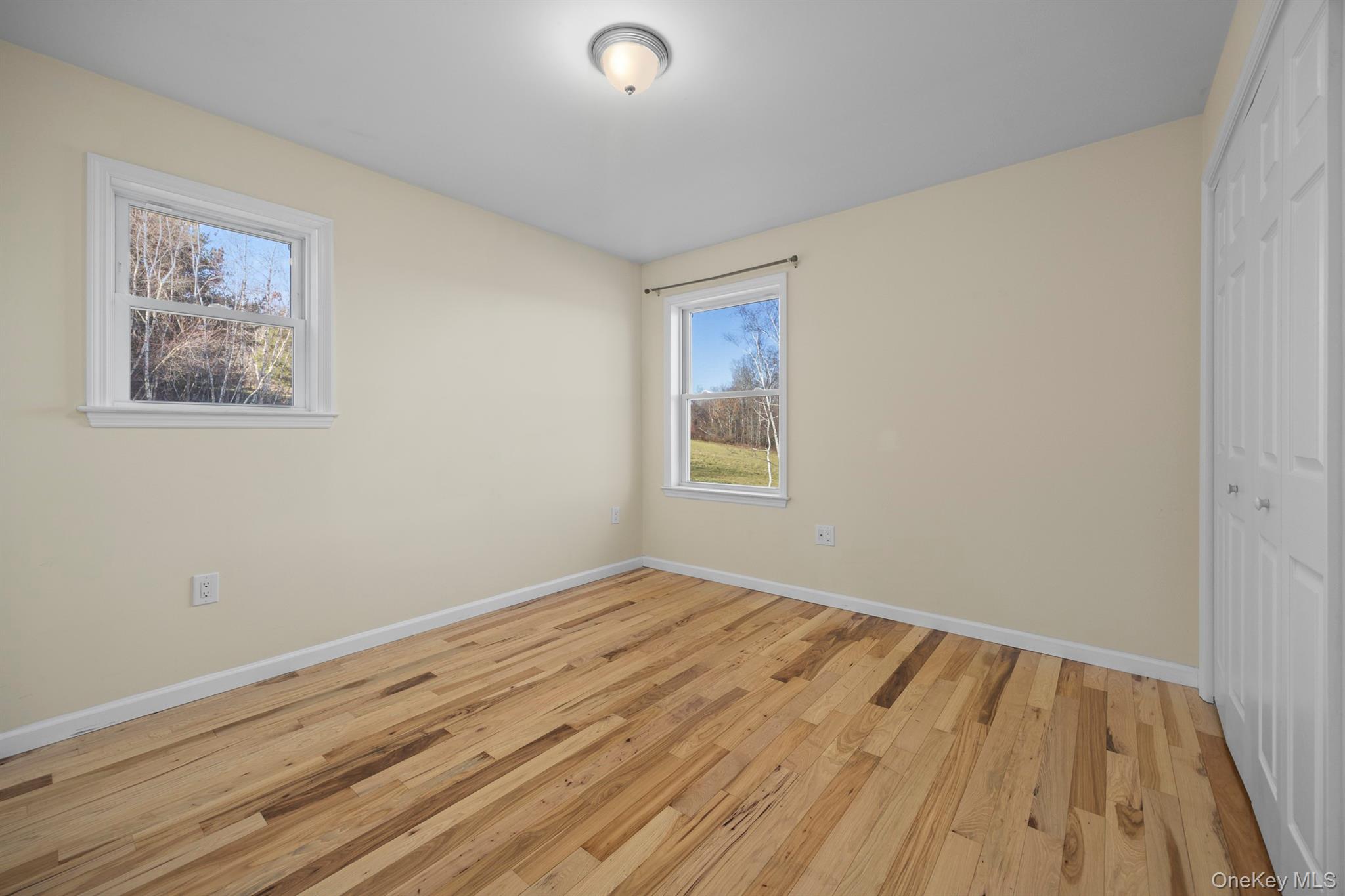 641 Smithfield Road Millerton, NY 12546 - Photo 13 of 20 a view of empty room with wooden floor